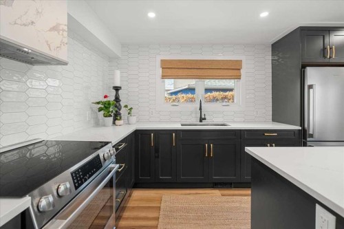 2023 35 Avenue Sw, Calgary, AB - Indoor Photo Showing Kitchen With Upgraded Kitchen