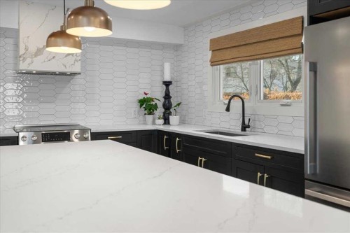 2023 35 Avenue Sw, Calgary, AB - Indoor Photo Showing Kitchen With Upgraded Kitchen