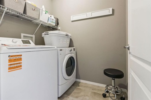 50 Nolanfield Lane Nw, Calgary, AB - Indoor Photo Showing Laundry Room