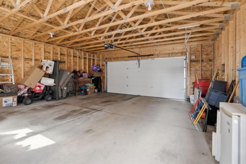 50 Nolanfield Lane Nw, Calgary, AB - Indoor Photo Showing Garage
