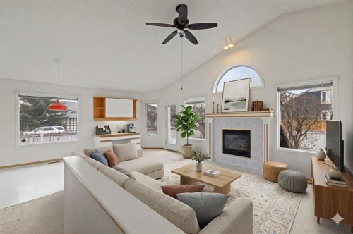 179 Sunlake Way Se, Calgary, AB - Indoor Photo Showing Living Room With Fireplace