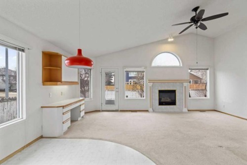 179 Sunlake Way Se, Calgary, AB - Indoor With Fireplace