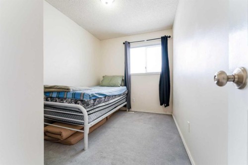 31 Coventry Lane Ne, Calgary, AB - Indoor Photo Showing Bedroom