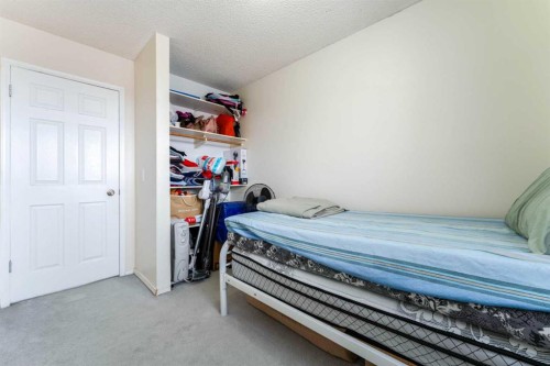 31 Coventry Lane Ne, Calgary, AB - Indoor Photo Showing Bedroom