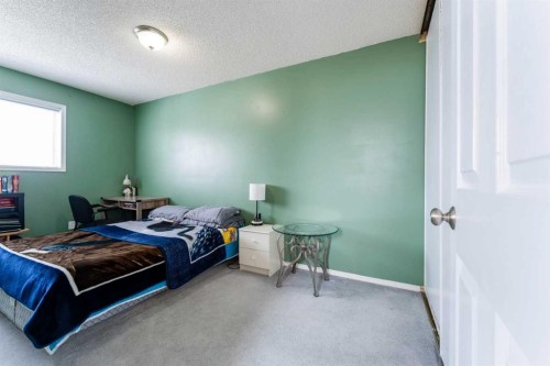 31 Coventry Lane Ne, Calgary, AB - Indoor Photo Showing Bedroom