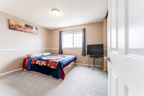 31 Coventry Lane Ne, Calgary, AB - Indoor Photo Showing Bedroom