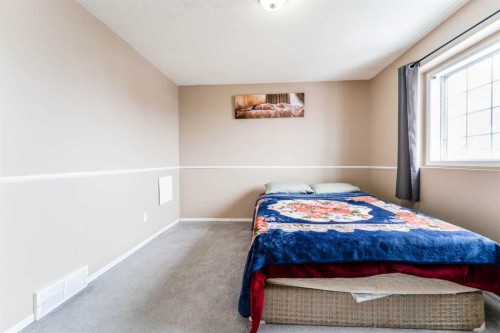 31 Coventry Lane Ne, Calgary, AB - Indoor Photo Showing Bedroom