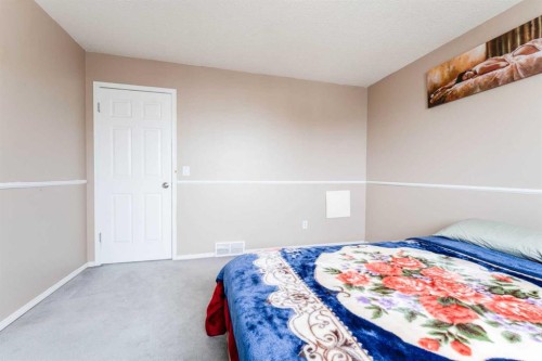 31 Coventry Lane Ne, Calgary, AB - Indoor Photo Showing Bedroom