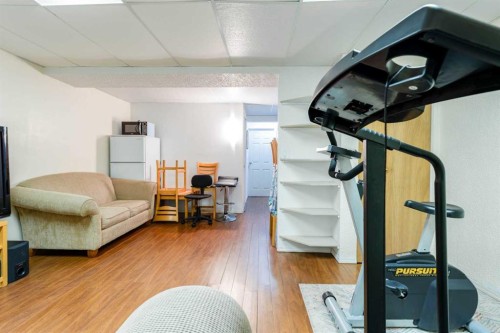 31 Coventry Lane Ne, Calgary, AB - Indoor Photo Showing Gym Room