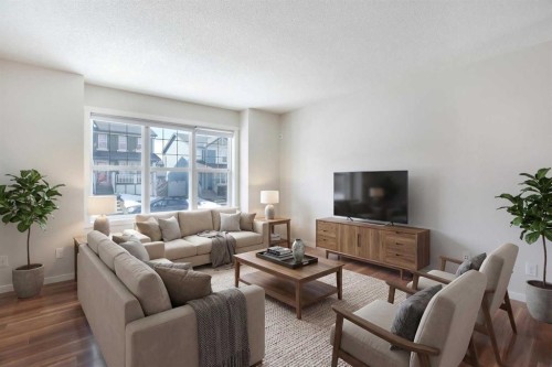 160 Panamount Way Nw, Calgary, AB - Indoor Photo Showing Living Room