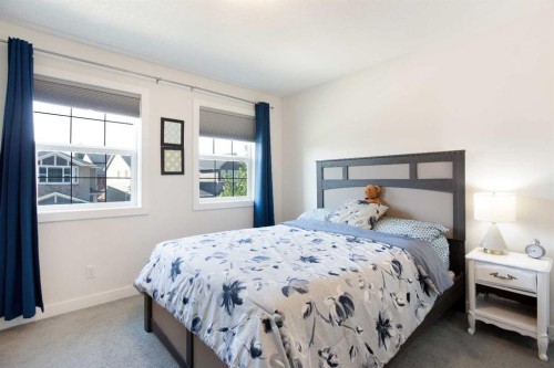58 Nolancrest Rise Nw, Calgary, AB - Indoor Photo Showing Bedroom