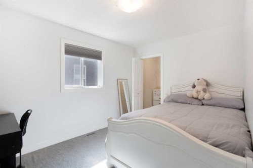 58 Nolancrest Rise Nw, Calgary, AB - Indoor Photo Showing Bedroom