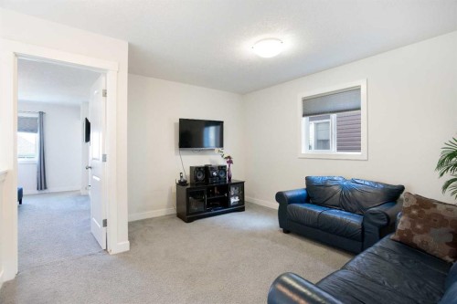 58 Nolancrest Rise Nw, Calgary, AB - Indoor Photo Showing Living Room