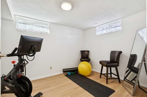407 Arlington Drive Se, Calgary, AB - Indoor Photo Showing Gym Room