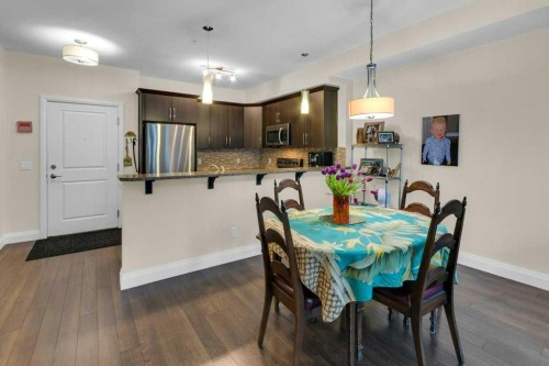 2104-15 Sunset Square, Cochrane, AB - Indoor Photo Showing Dining Room