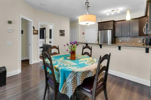 2104-15 Sunset Square, Cochrane, AB - Indoor Photo Showing Dining Room