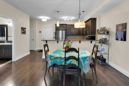 2104-15 Sunset Square, Cochrane, AB - Indoor Photo Showing Dining Room