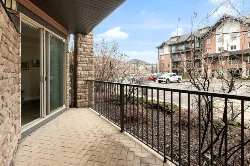 2104-15 Sunset Square, Cochrane, AB - Outdoor With Balcony With Exterior