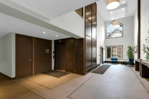 2104-15 Sunset Square, Cochrane, AB - Indoor Photo Showing Other Room