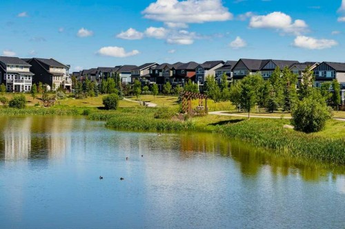 2104-15 Sunset Square, Cochrane, AB - Outdoor With Body Of Water With View