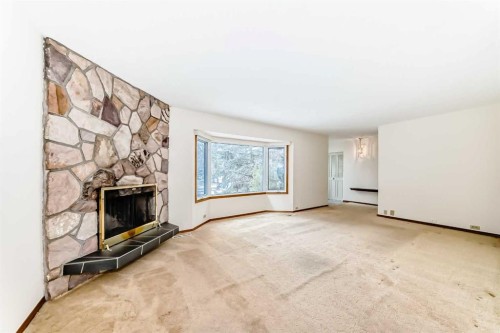5116 33 Street Nw, Calgary, AB - Indoor With Fireplace