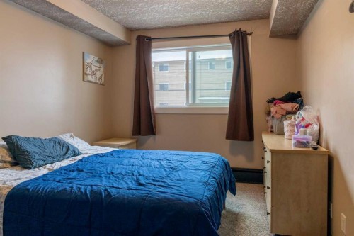 204-717 4A Street Ne, Calgary, AB - Indoor Photo Showing Bedroom