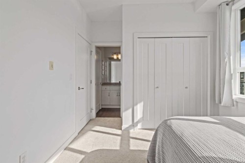 404-10 Walgrove Se, Calgary, AB - Indoor Photo Showing Bedroom