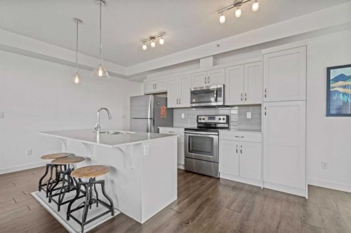 404-10 Walgrove Se, Calgary, AB - Indoor Photo Showing Kitchen With Stainless Steel Kitchen