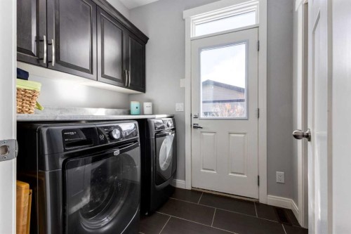 306 Cooperstown Common Sw, Airdrie, AB - Indoor Photo Showing Laundry Room