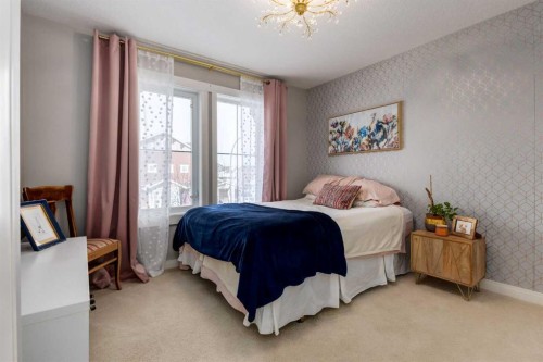 306 Cooperstown Common Sw, Airdrie, AB - Indoor Photo Showing Bedroom