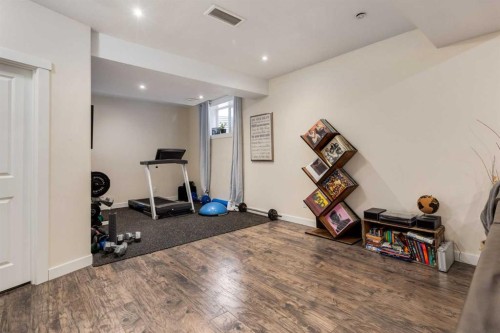 306 Cooperstown Common Sw, Airdrie, AB - Indoor Photo Showing Gym Room