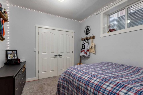 306 Cooperstown Common Sw, Airdrie, AB - Indoor Photo Showing Bedroom