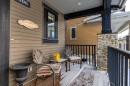 306 Cooperstown Common Sw, Airdrie, AB  - Outdoor With Deck Patio Veranda With Exterior 