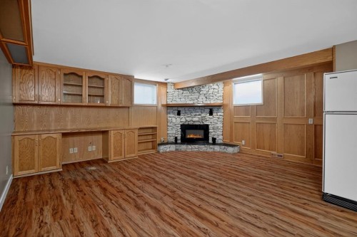 48 Carnarvon Way Nw, Calgary, AB - Indoor With Fireplace