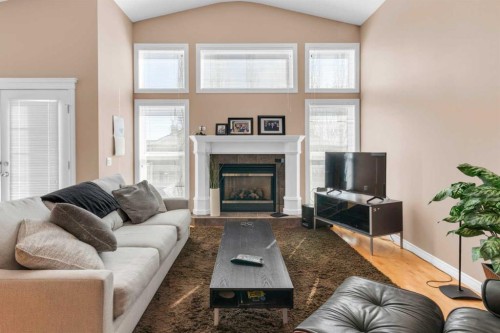135 Citadel Estates Place Nw, Calgary, AB - Indoor Photo Showing Living Room With Fireplace
