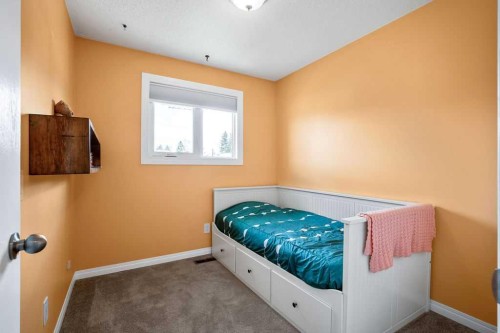 264 Midridge Crescent Se, Calgary, AB - Indoor Photo Showing Bedroom