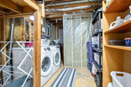264 Midridge Crescent Se, Calgary, AB - Indoor Photo Showing Laundry Room