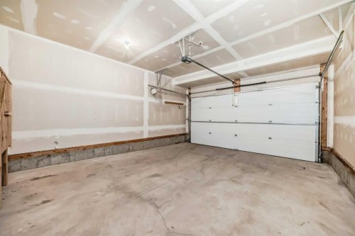 64 Masters Row Se, Calgary, AB - Indoor Photo Showing Garage