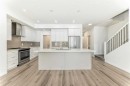 64 Masters Row Se, Calgary, AB  - Indoor Photo Showing Kitchen With Stainless Steel Kitchen With Upgraded Kitchen 