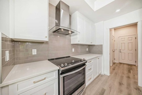 64 Masters Row Se, Calgary, AB - Indoor Photo Showing Kitchen