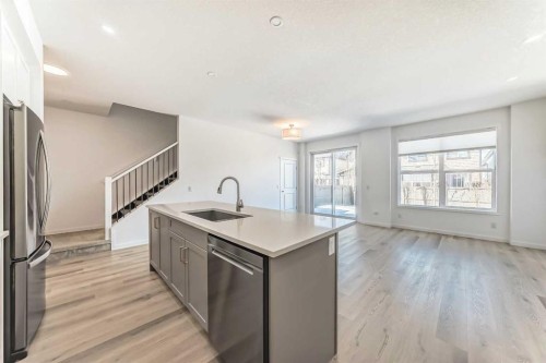 64 Masters Row Se, Calgary, AB - Indoor Photo Showing Kitchen With Stainless Steel Kitchen