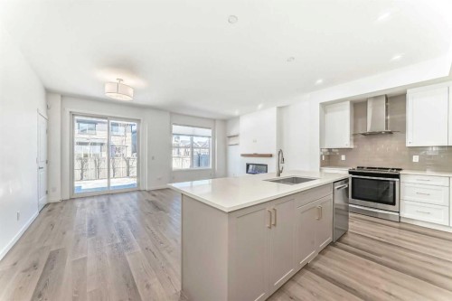 64 Masters Row Se, Calgary, AB - Indoor Photo Showing Kitchen With Upgraded Kitchen