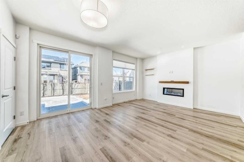 64 Masters Row Se, Calgary, AB - Indoor With Fireplace