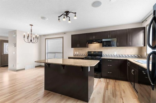 106 Luxstone Way Sw, Airdrie, AB - Indoor Photo Showing Kitchen
