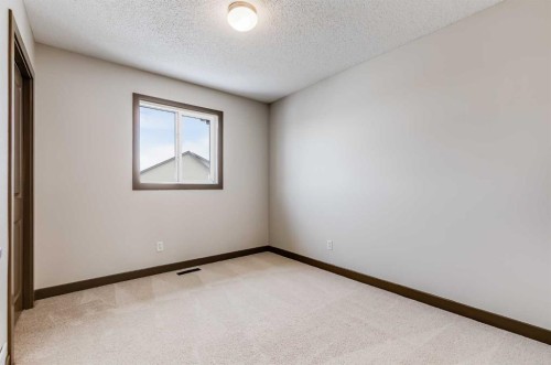 106 Luxstone Way Sw, Airdrie, AB - Indoor Photo Showing Other Room
