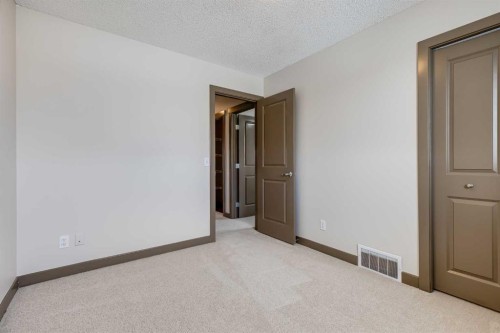 106 Luxstone Way Sw, Airdrie, AB - Indoor Photo Showing Other Room