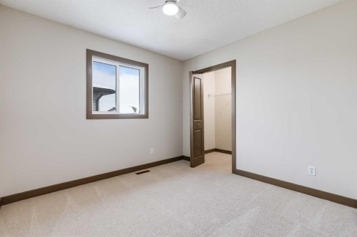 106 Luxstone Way Sw, Airdrie, AB - Indoor Photo Showing Other Room