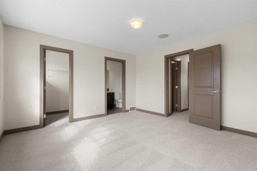 106 Luxstone Way Sw, Airdrie, AB - Indoor Photo Showing Other Room