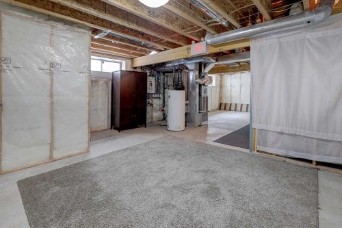 106 Luxstone Way Sw, Airdrie, AB - Indoor Photo Showing Basement