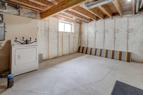 106 Luxstone Way Sw, Airdrie, AB - Indoor Photo Showing Laundry Room